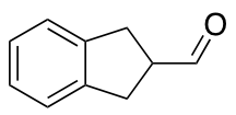 2,3-dihydro-1H-indene-2-carbaldehyde