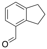 2,3-dihydro-1H-indene-4-carbaldehyde