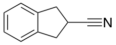 Indan-2-carbonitrile
